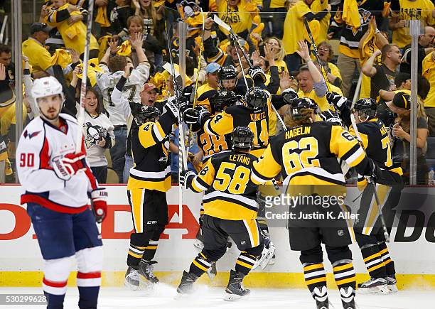 Nick Bonino of the Pittsburgh Penguins celebrates his game winning overtime goal against the Washington Capitals in Game Six of the Eastern...
