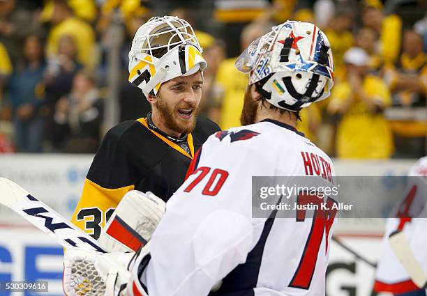 Matt Murray of the Pittsburgh Penguins and Braden Holtby of the Washington Capitals shake hands after the Pittsburgh Penguins defeated the Washington...