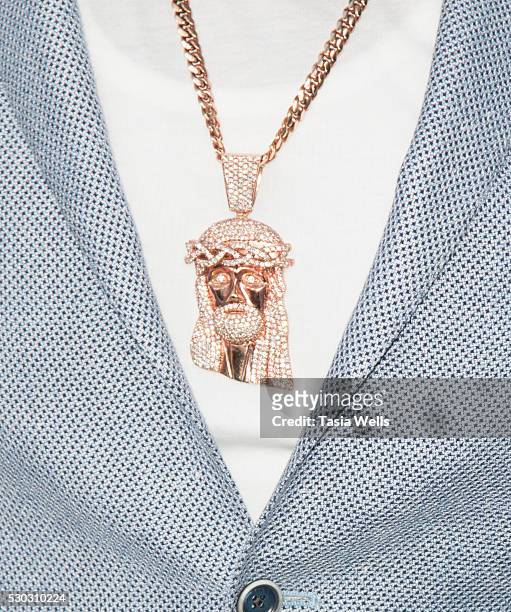 Rapper Curtis '50 Cent' Jackson, necklace detail, attends the For Your Consideration Event for STARZs' "Power" at ArcLight Hollywood on May 10, 2016...