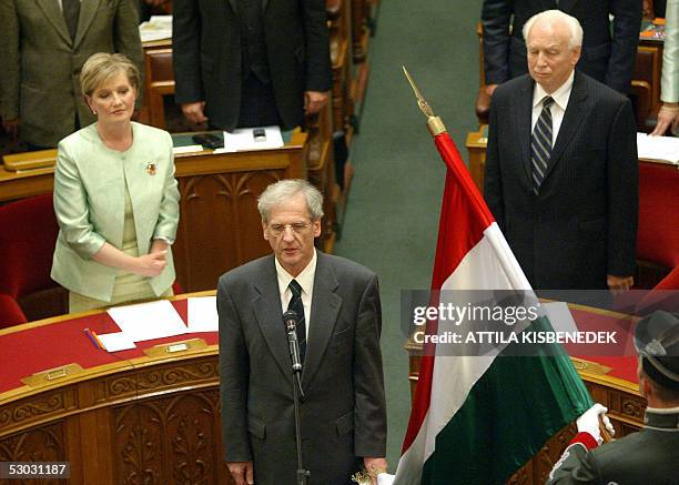 Flanked by his Socialist party competitor, the speaker of the Hungarian Parliament Katalin Szili , and acting President Ferenc Madl , the new...