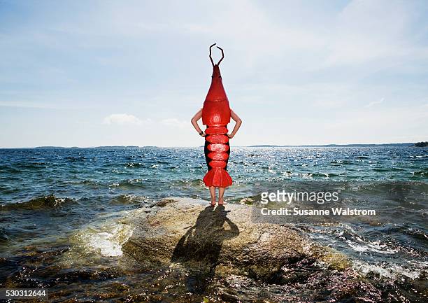 a man dressed up to be a crayfish - crayfish stock pictures, royalty-free photos & images