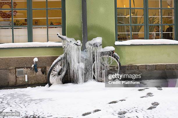 a bicykle coverd with ice - snow coverd stock pictures, royalty-free photos & images