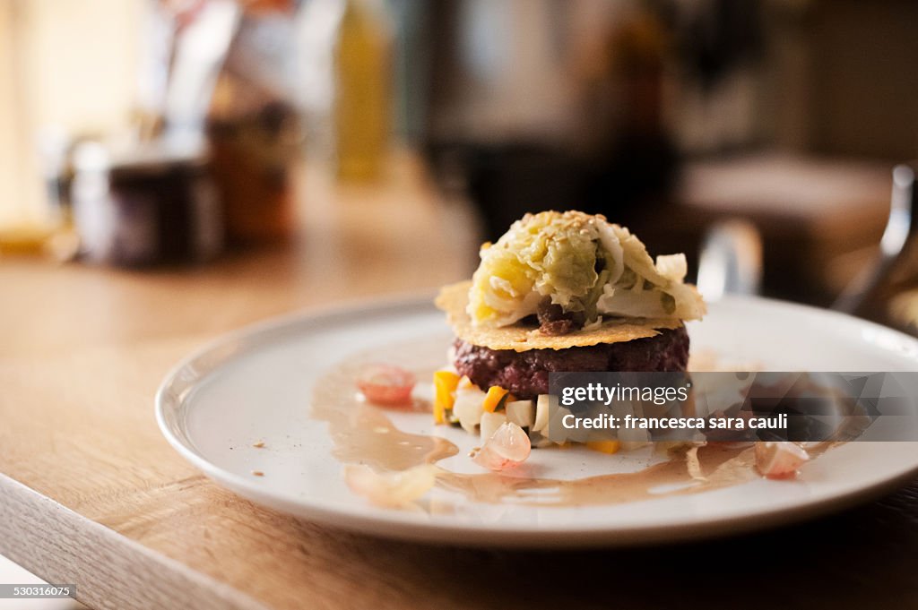 Big hamburger in a dish