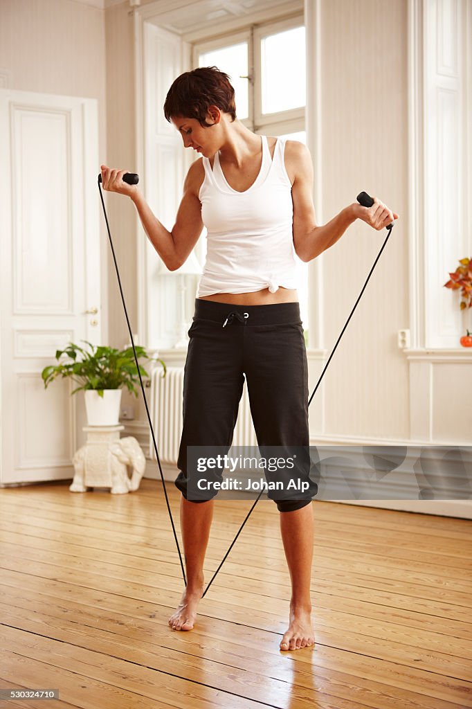 Reaching Rope Stretch Woman Stretching With Skipping Rope High-Res Stock Photo - Getty Images