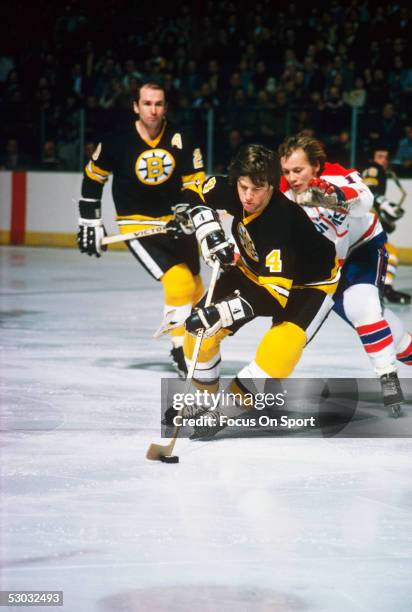 Boston Bruins' defenceman Bobby Orr carries the puck against the Washington Capitals during a game at Capital Centre circa 1970's in Washington, DC.