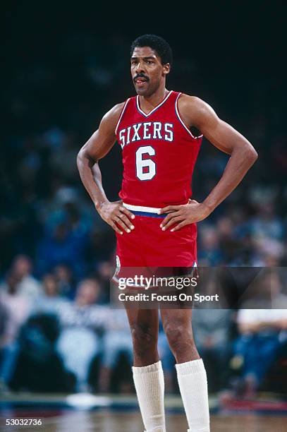 The Philadelphia 76ers' forward Julius Erving stands on the court during a game. NOTE TO USER: User expressly acknowledges and agrees that, by...