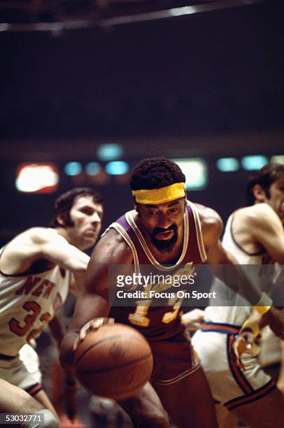 Los Angeles Lakers center Wilt Chamberlain dribbles the ball against the New York Knicks during a game at Madison Square Garden circa 1970's in New...