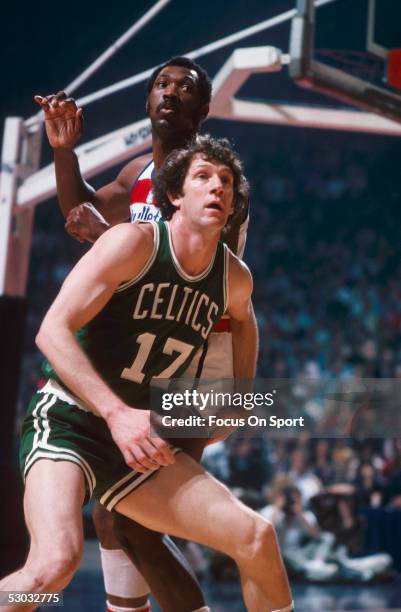 Boston Celtics' John Havlick blocks against the Washington Bullets' Elvin Hayes at Capital Center circa the 1970's in Washington, DC. NOTE TO USER:...