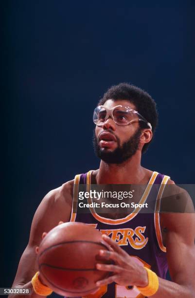 Los Angeles Lakers' center Kareem Abdul Jabbar takes aim to shoot at the foul line. NOTE TO USER: User expressly acknowledges and agrees that, by...