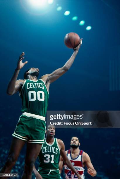 Boson Celtics' Robert Parish jumps for a layup against the Washington Bullets at Capital Center circa early 1980's in Washington, D.C.. NOTE TO USER:...