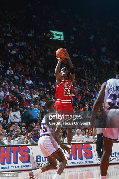 Chicago Bulls' forward Michael Jordan makes a jumpshot during a game against the Washington Bullets at Capital Centre circa 1991 in Washington, D.C.....