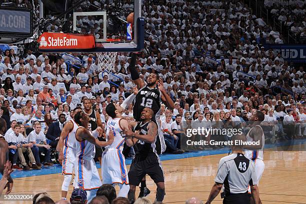 LaMarcus Aldridge of the San Antonio Spurs shoots the ball during the game against the Oklahoma City Thunder in Game Four of the Western Conference...