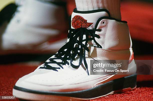 Detail of the "Air Jordan" Nike shoes worn by Chicago Bulls' center Michael Jordan during a game against the Washington Bullets at Capital Centre...