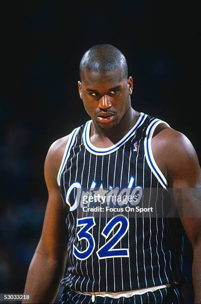 Orlando Magic' center Shaquille O'Neal stands on the court during a game against the Washington Bullets at Capital Center circa 1994 in Washington,...