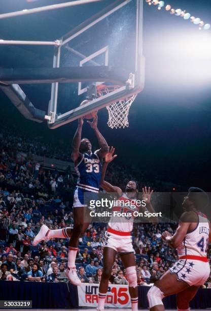 Denver Nuggets' David Thompson jumps for a layup during a game against the Washington Bullets at Capital Centre circa 1978 in Washington, D.C.. NOTE...