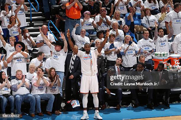 Nazr Mohammed of the Oklahoma City Thunder cheers his teammates on during the game against the San Antonio Spurs during Game Four of the NBA Western...