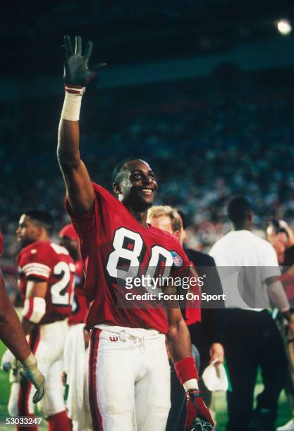 San Francisco 49ers' Jerry Rice raises his hand and gestures to the crowd during Super Bowl XXIX against the San Diego Chargers at Joe Robbie Stadium...