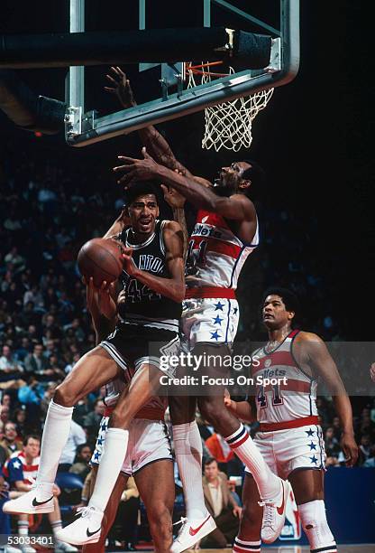 San Antonio Spurs' George Gervin jumps and grabbs a rebound during a game against the Washington Bullets circa the 1980's in Washington, D.C.. NOTE...