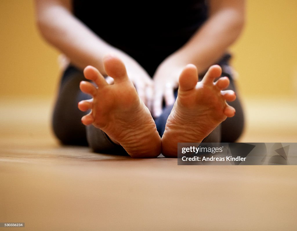 A woman practising yoga Skane Sweden