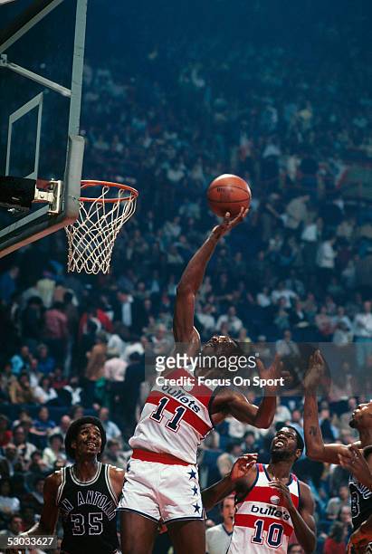 Washington Bullets' forward Elvin Hayes jumps for a layup against the San Antonio Spurs during a game at Capital Centre circa 1979 in Washington...