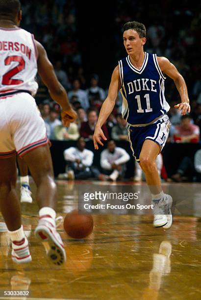 Duke player dribbles against the University of Maryland.