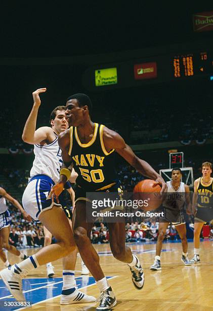 The Navy's David Robinson dribbles downcourt during a NCAA basketball game against Duke.