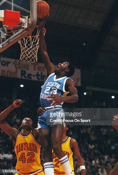 University of North Carolina's Michael Jordan jumps for a layup during a game.
