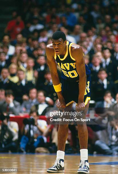 The Navy's David Robinson rests for a moment on the court during a NCAA basketball game against Duke.