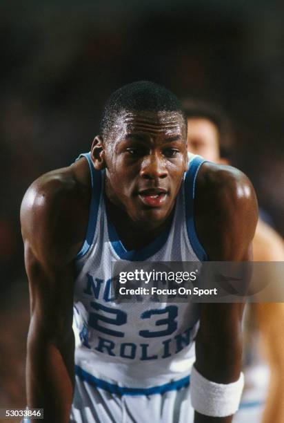 University of North Carolina's Michael Jordan rests for a moment on the court during a game.