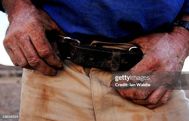 Stockman Gordon Litchfield from Wilpoorinna sheep and cattle station stands on his property June 7, 2005 in Leigh Creek, Australia is enduring its...