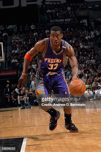 Amare Stoudemire of the Phoenix Suns moves the ball in Game four of the Western Conference Finals with the San Antonio Spurs during the 2005 NBA...