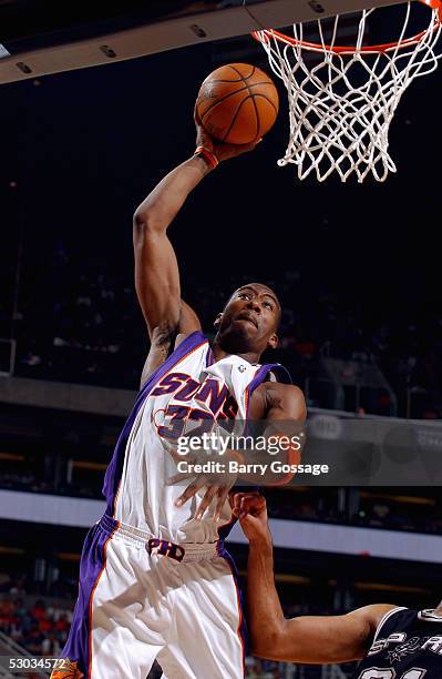 Amare Stoudemire of the Phoenix Suns dunks in Game five of the Western Conference Finals with the San Antonio Spurs during the 2005 NBA Playoffs at...