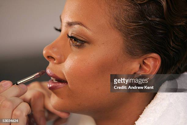 Model Eva Pigford, winner of America's Next Top Model, working behind the scenes during a photo shoot for CoverGirl's new mascara on February 18,...
