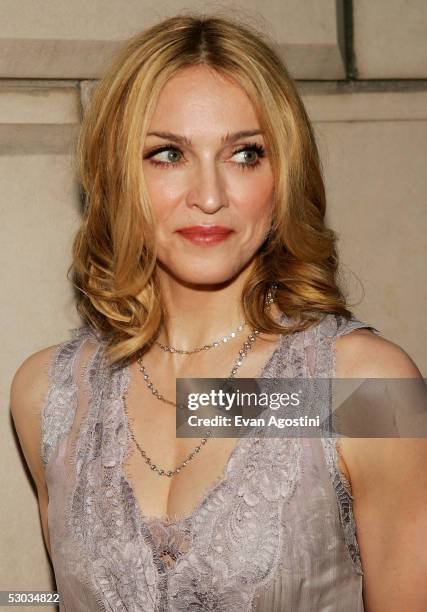 Madonna arrives at a party for her new children's book "Lotsa De Casha" at Bergdorf Goodman June 7, 2005 in New York City.