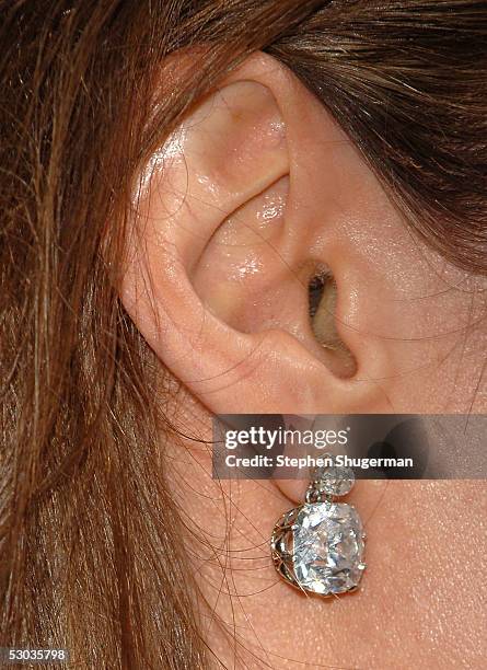 Close-up of actress Angelina Jolie's earring as she arrives at the premiere of "Mr. And Mrs. Smith" at the Mann Village Theater on June 7, 2005 in...