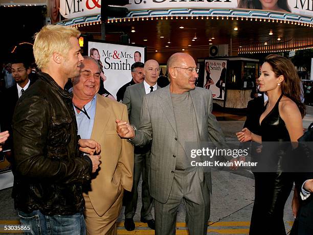 Actor Brad Pitt, Regency Enterprises' David Matalon, Producer Arnon Milchan and actress Angelina Jolie arrive at the premiere of "Mr. & Mrs. Smith"...