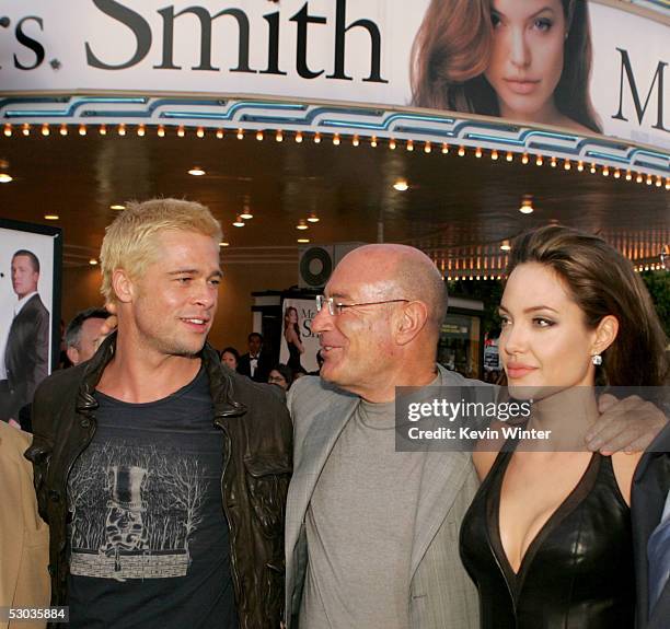 Actor Brad Pitt, Producer Arnon Milchan and actress Angelina Jolie arrive at the premiere of "Mr. & Mrs. Smith" at the Mann Village Theater on June...