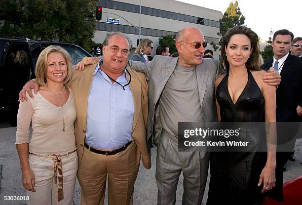 Guest, Regency Enterprises' David Matalon, Producer Arnon Milchan and actress Angelina Jolie arrive at the premiere of "Mr. & Mrs. Smith" at the Mann...