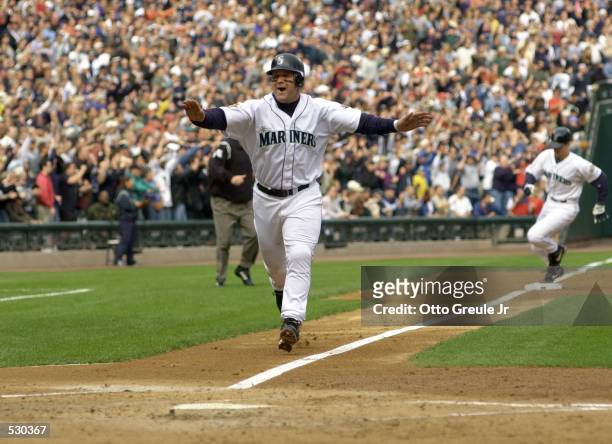 Edgar Martinez of the Seattle Mariners score the first run against the Cleveland Indians during the second inning of the American League Divisional...