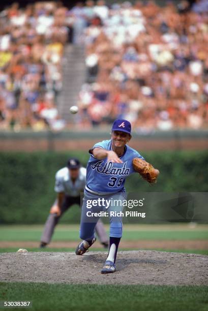 Phil Niekro of the Atlanta Braves throws the pitch during a game. Phil Niekro played for the Atlanta Braves from 1964-1983 and returned in 1987.