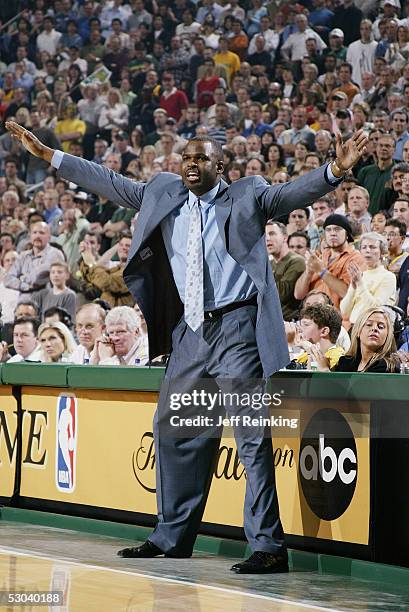 Head coach Nate McMillan of the Seattle SuperSonics coaches against the San Antonio Spurs in Game 6 of the Western Conference Semifinals during the...