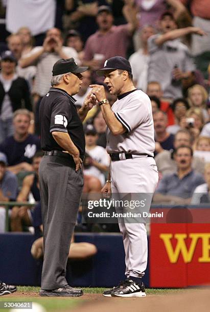 Manager Joe Torre of the New York Yankees argues with umpire Larry Vanover in the fifth inning of a game against the Milwaukee Brewers on June 8,...