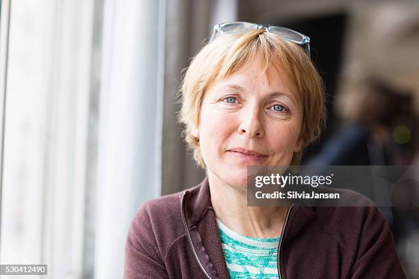 beautiful senior woman portrait happiness - 50s woman stockfoto's en -beelden