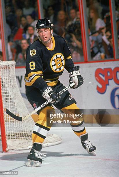 Canadian hockey player Cam Neely of the Boston Bruins skates near the side of the net during a game against the Philadelphia Flyers at the Spectrum,...