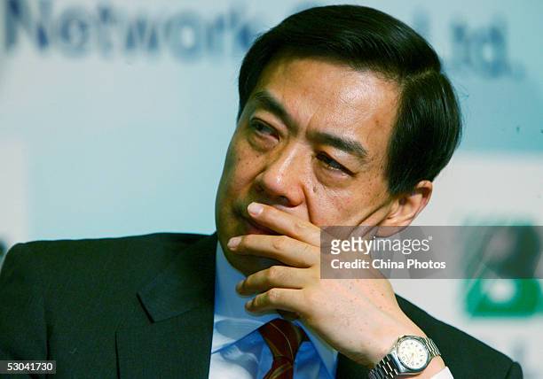 Chinese Commerce Minister Bo Xilai listens during the Forum on World Trade in Services on June 9, 2005 in Shanghai, China. The two-day forum will...