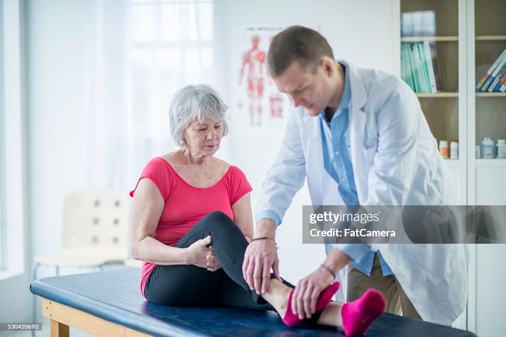 Senior Woman Working with a Physical Therapist