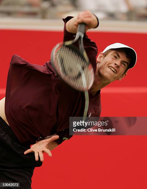 Andrew Murray of Great Britian serves during his third round match against Thomas Johansson of Sweden at the Stella Artois Tennis Championships at...