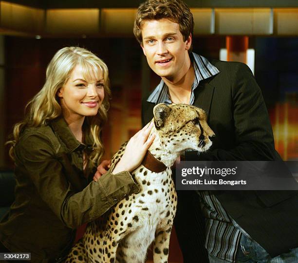 Yvonne Catterfeld and boyfriend Wayne Carpendale and leopard Bagheera at the Johannes B. Kerner Show on June 9, 2005 in Hamburg, Germany.