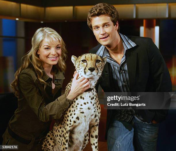 Yvonne Catterfeld and boyfriend Wayne Carpendale and leopard Bagheera at the Johannes B. Kerner Show on June 9, 2005 in Hamburg, Germany.