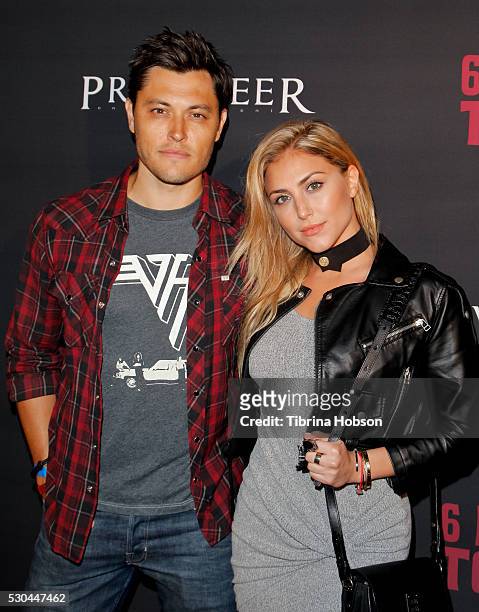 Blair Redford and Cassie Scerbo attend the launch of '6 Bullets To Hell' on May 10, 2016 in Los Angeles, California.